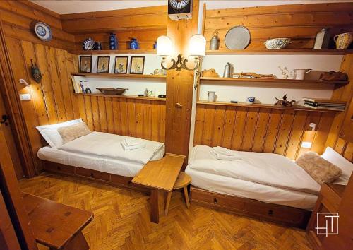 Katil atau katil-katil dalam bilik di HT - Ciasa Ca'Mora nel centro di Cortina d'Ampezzo