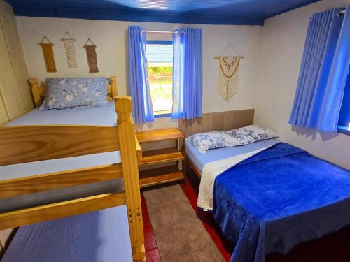 Voodi või voodid majutusasutuse Sítio Vovô Hehr, aconchegante com muito lazer nas montanhas, Domingos Martins-ES, Brasil toas