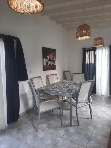 a dining room with a table and chairs at SILVIA in Ostende