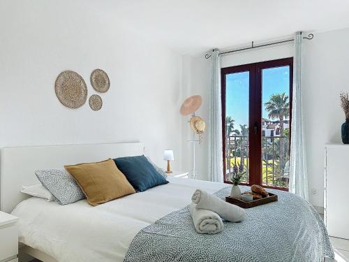 Posteľ alebo postele v izbe v ubytovaní Vive Vera Rentals - Ático en 1º línea con vistas al mar