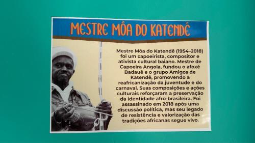 a poster for a meeting of a nigerian man dokie at Casa Bantu - Vila Rosa in Vera Cruz de Itaparica