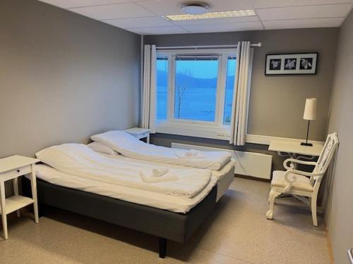 Ένα ή περισσότερα κρεβάτια σε δωμάτιο στο Guesthouse Vågen