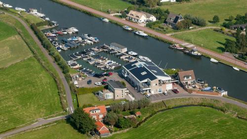 an aerial view of a marina with boats in the water at Appartementen Casa del Lago in Lisse