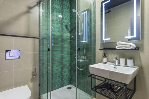 Un baño de Amine Apart-Hotel by Stayinn
