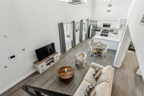 a living room with a couch and a table at Stay at Luna on 800 Callowhill in Philadelphia