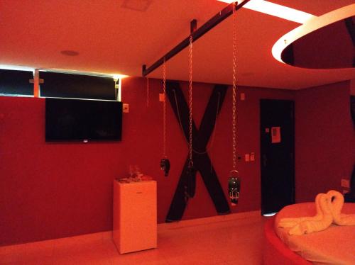 TV a/nebo společenská místnost v ubytování CAPRI Motel