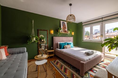 Llit o llits en una habitació de Green & Bright Central