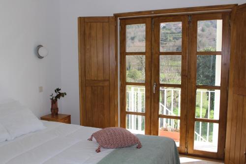 Postel nebo postele na pokoji v ubytování R3 - Casa da Moleira