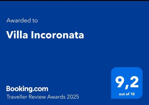 a blue screen with the text awarded to villa incognacc at Villa Incoronata in Agerola