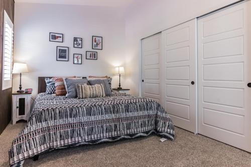 a bedroom with a bed and a closet at Elk Rim 1156 Pine in Pine
