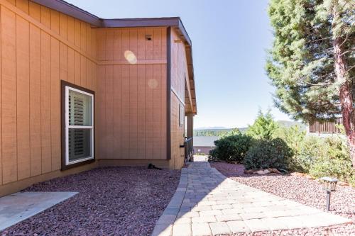 a side view of a house with a window at Elk Rim 1156 Pine in Pine