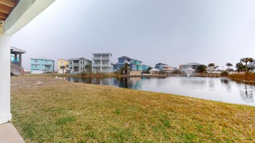a view of a river with houses and condos at Bella Vista & Four Winds House in Padre Island