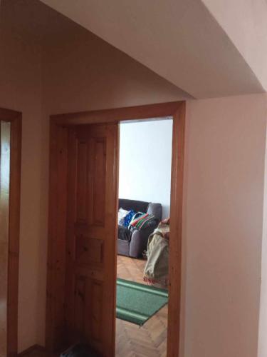 a living room with a couch and a window at Біля автовокзалу in Lviv