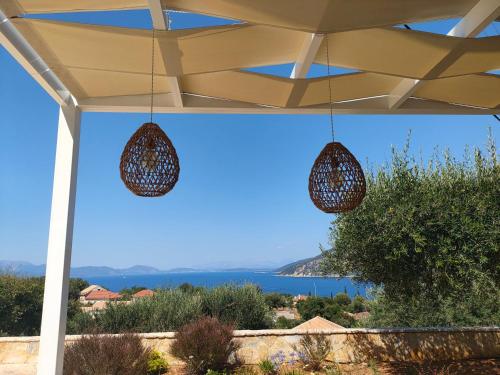 a view of the ocean from the porch of a house at Villa Sasà in Fiskardo