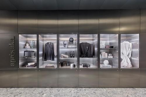 a display case with a bunch of clothes at Hotel AKA Boston Common in Boston