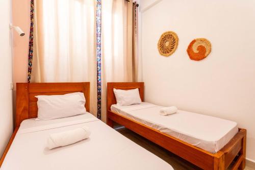Ένα ή περισσότερα κρεβάτια σε δωμάτιο στο Lulubay Serviced Appartments