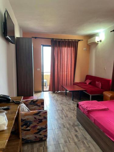 TV a/nebo společenská místnost v ubytování Byblos inn