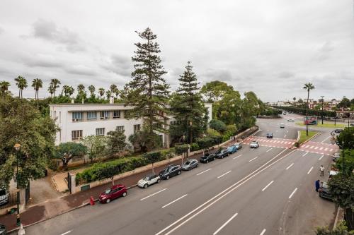an aerial view of a street with cars parked on it at Rabat Centro Apartments in Rabat