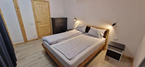 En eller flere senge i et værelse på Old town luxury apartment