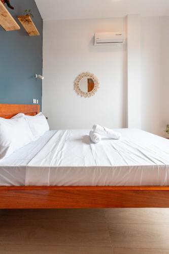 Ένα ή περισσότερα κρεβάτια σε δωμάτιο στο Lulubay Serviced Appartments