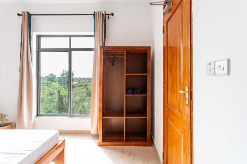 Ένα ή περισσότερα κρεβάτια σε δωμάτιο στο Lulubay Serviced Appartments