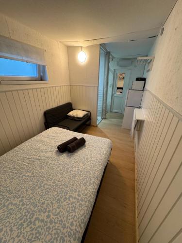 Postel nebo postele na pokoji v ubytování Chambre 1 avec salle de bain privative