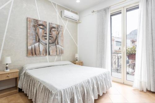 Una cama o camas en una habitación de Giada