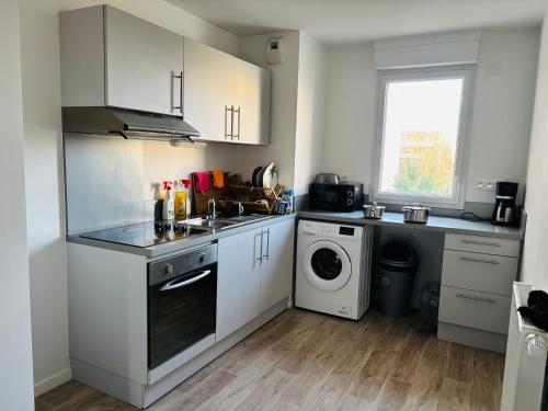 Dapur atau dapur kecil di Chambre spacieuse et lumineuse chez l habitant