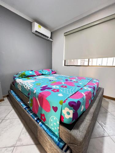 Postel nebo postele na pokoji v ubytování Rodadero Excelente Apartamento