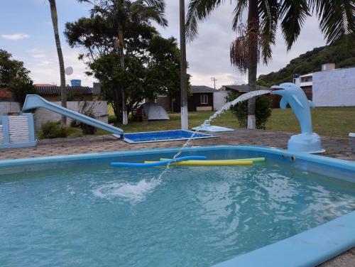 Kolam renang di atau dekat dengan Quartos com banheiro compartilhado - BELEZAS DE LAGUNA