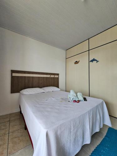 Katil atau katil-katil dalam bilik di Quartos com banheiro compartilhado - BELEZAS DE LAGUNA