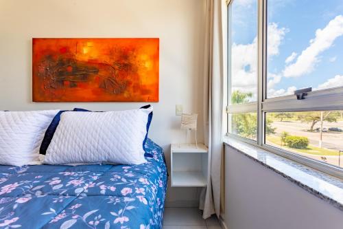 En eller flere senge i et værelse på Premier 215 - LakeSide - Stúdio Amanhecer - Beira Lago - By Hospede Fácil