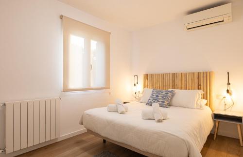 Postel nebo postele na pokoji v ubytování Orquidia by Rentallorca - Private pool and Garden