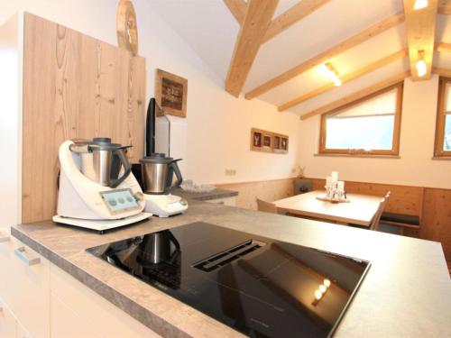 a kitchen with a mixer on a counter at Apartment Melissa in Zellberg