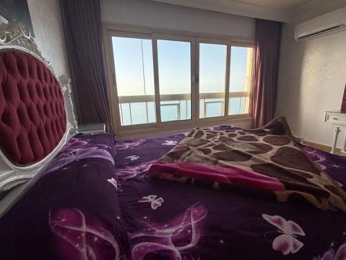 Una cama o camas en una habitación de Gleem sea view 1