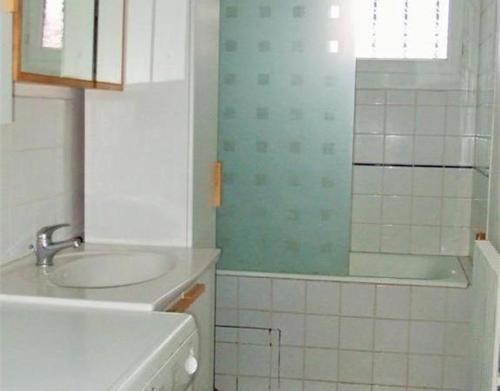 Koupelna v ubytování Chambre chez l'habitant dans T4 hyper proche de la gare SNCF et à 300m de la gare routière