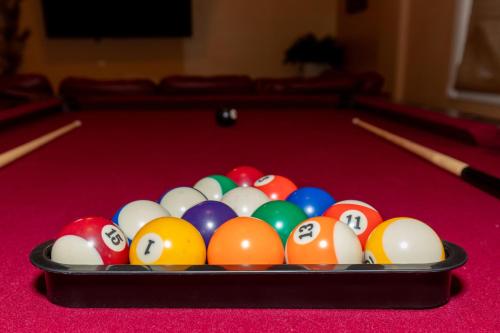 a group of pool balls on a pool table at The Jazz Club Downtown Sandusky in Sandusky