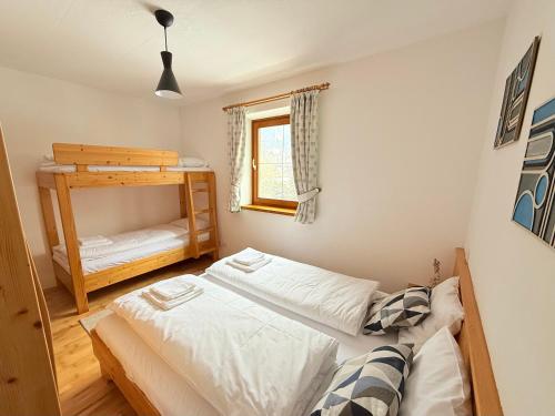 Ένα ή περισσότερα κρεβάτια σε δωμάτιο στο Joy Apartment