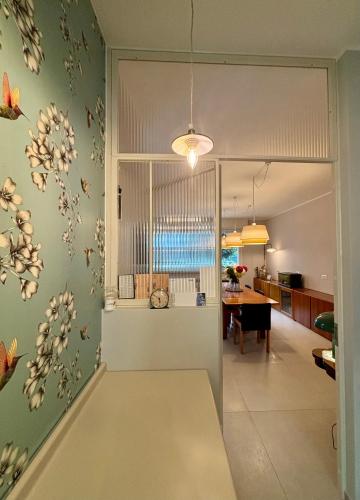 a kitchen and dining room with a view of a room at Baki B&B in Rimini