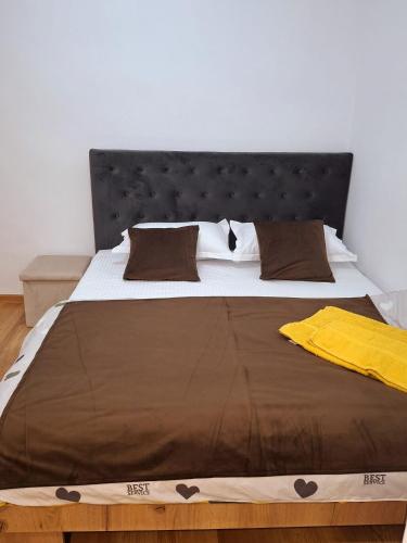 Postel nebo postele na pokoji v ubytování Merry Home