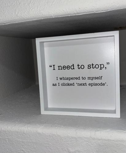 a sign on a wall that says i need to stop at Hill Country Hilltop Haven in Bee Cave