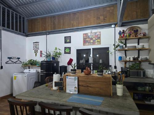 a kitchen with a table in a room at Casa Vacacional R2 in Santa Rosa