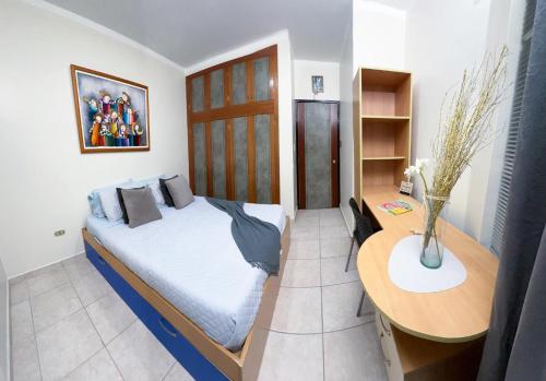 Katil atau katil-katil dalam bilik di Suite Jardín un hospedaje práctico y genial