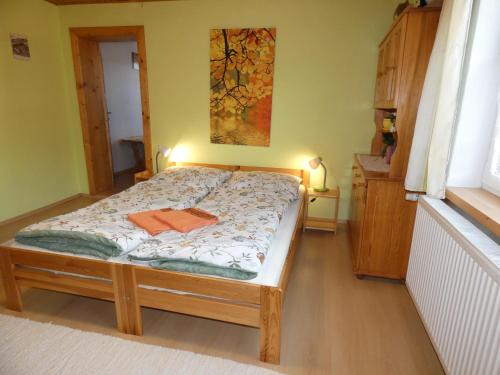 a bedroom with a bed in a room at Forester Apartment Zuberec in Zuberec