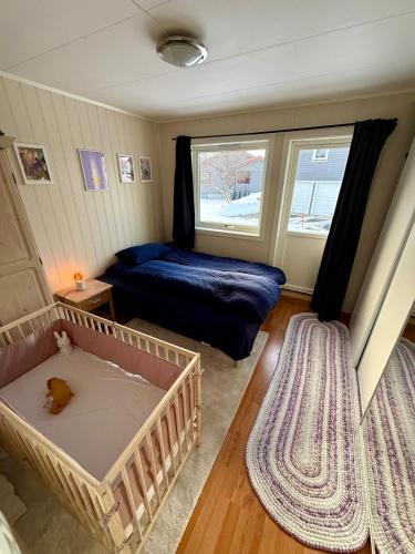 Ein Bett oder Betten in einem Zimmer der Unterkunft Perfect house in Henningsvær with sea-view