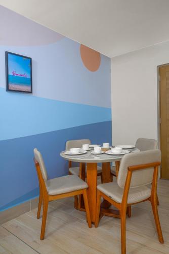 a dining room with a table and chairs at Radisson Riviera Panama in Punta Chame