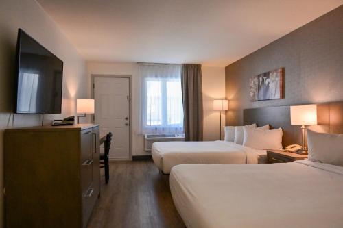 Postel nebo postele na pokoji v ubytování Repotel Levis