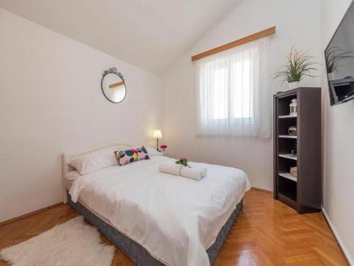 Postel nebo postele na pokoji v ubytování Villa Antonella