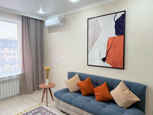 Khu vực ghế ngồi tại Almaty Aspan Comfort Apartment