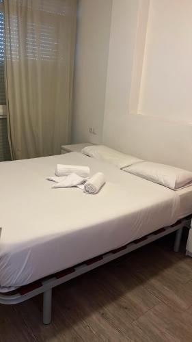 Posteľ alebo postele v izbe v ubytovaní Bonito apartamento cerca del puerto